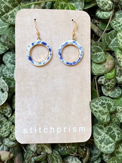 White Blue Speckled Hollow Circles
